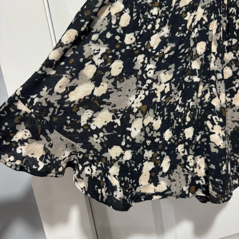 Free People Black and Cream Floral Wrap Romper with 3/4 Sleeves 02-0074